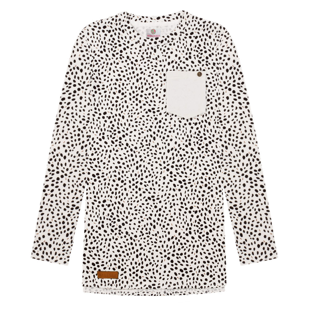 white leopard monogrammed sweatshirt in front of christmas tree