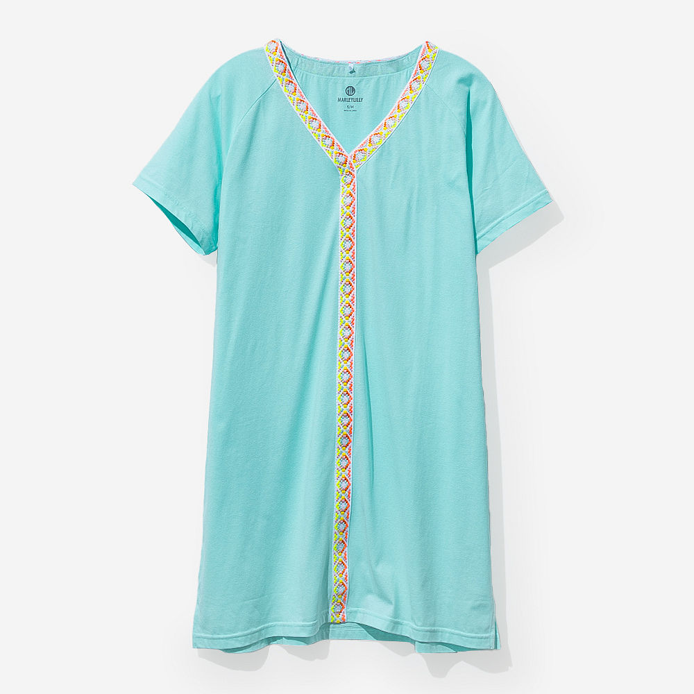 close up of monogrammed accent cover up in ocean