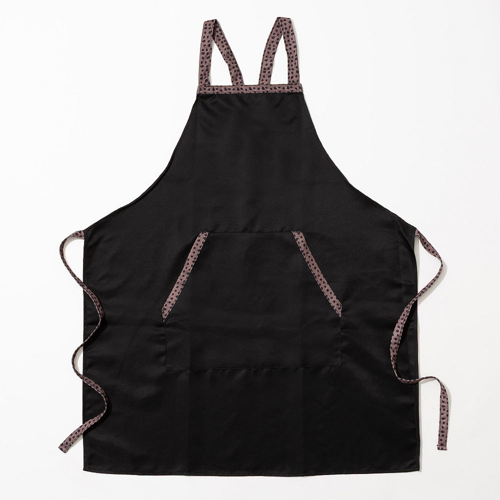 black with leopard monogrammed apron on hanger