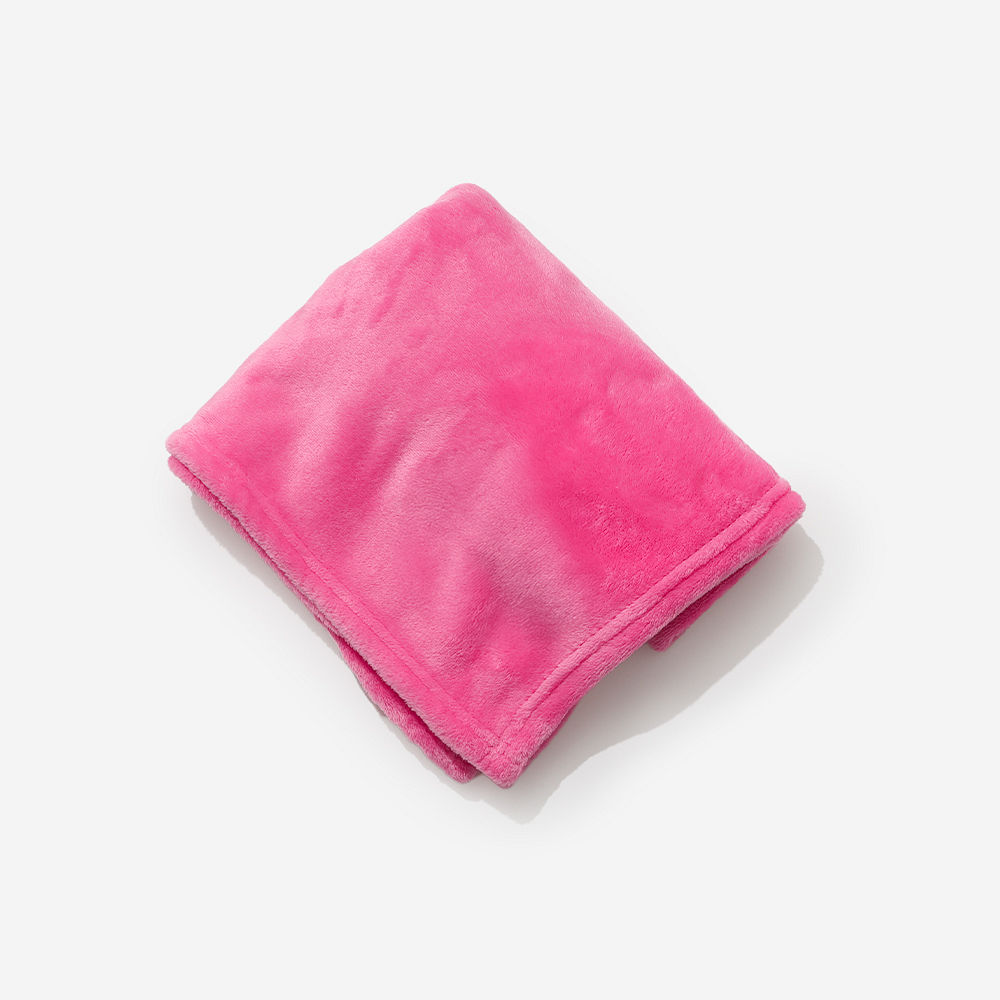 navy blue baby blanket flatlay with baby wearable blanket