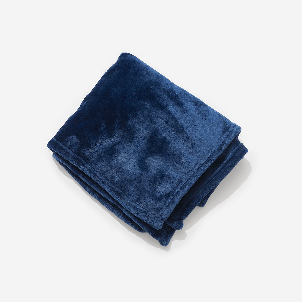navy blue baby blanket flatlay with baby wearable blanket