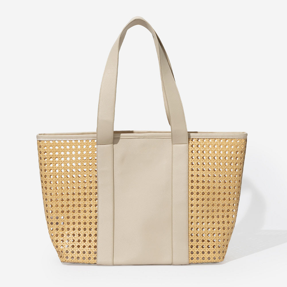monogrammed caning tote bag upclose