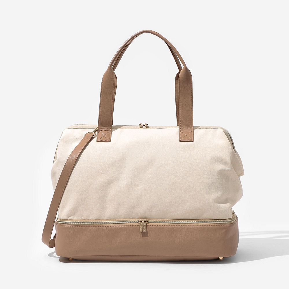 ivory canvas weekender on vintage suitcase