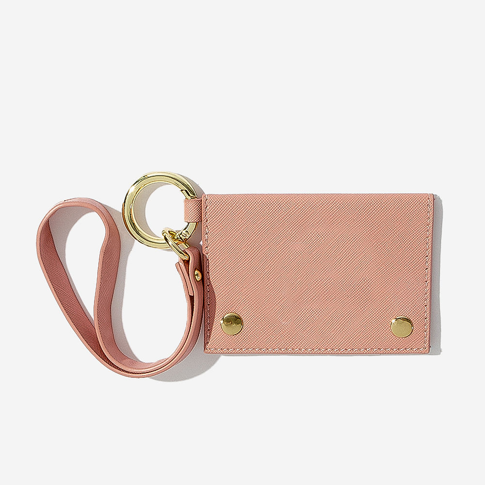 close up of girl holding mint card holder