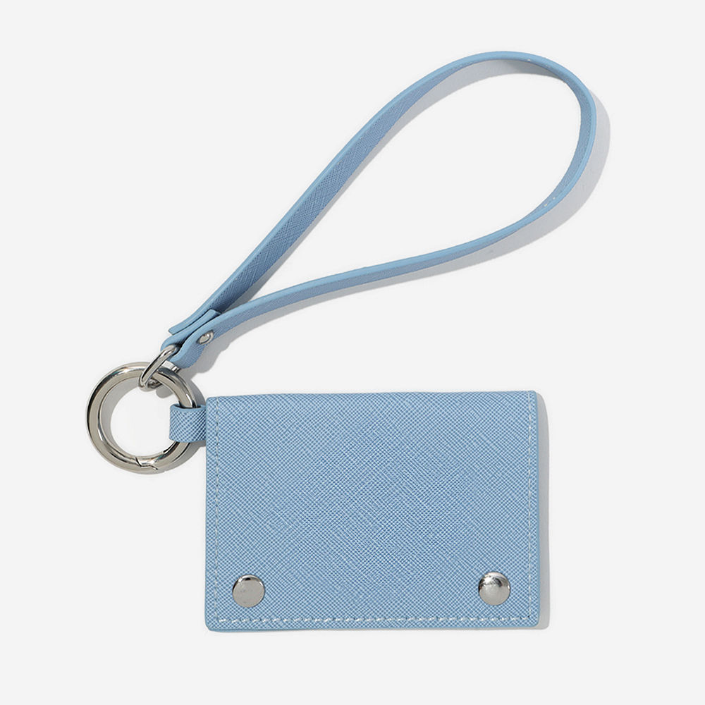 close up of girl holding mint card holder