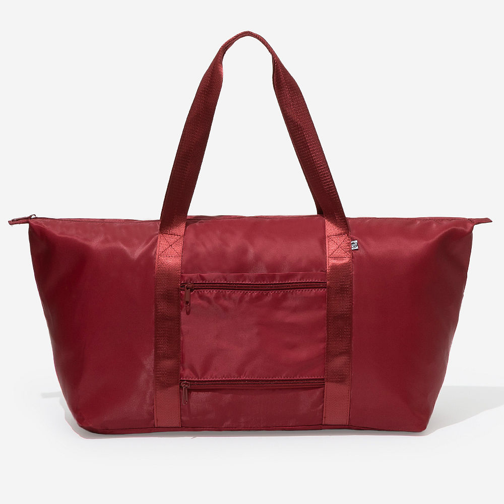 mushroom gray monogrammed carry on weekend bag on olive background