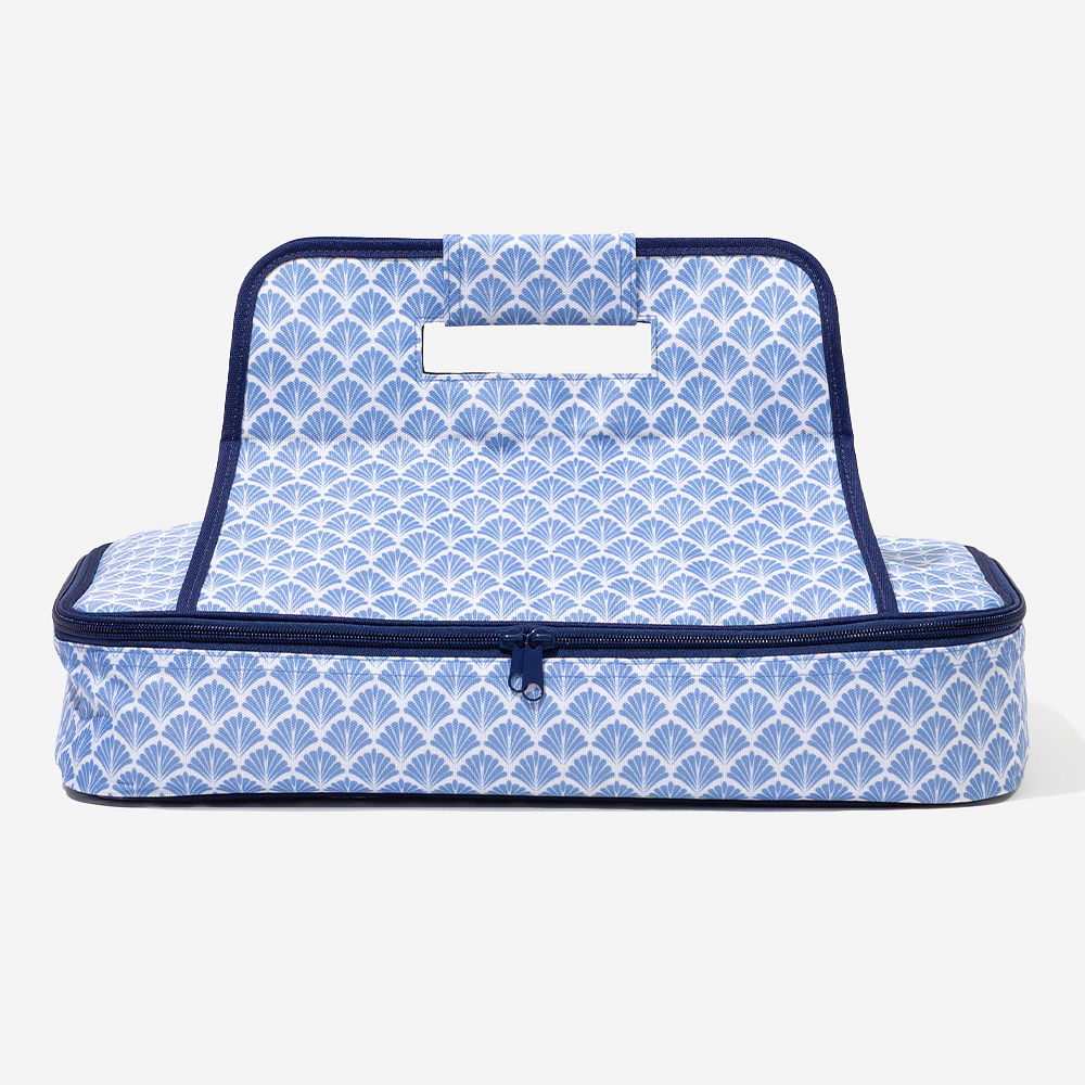 blue shells casserole carrier flatlay with apron