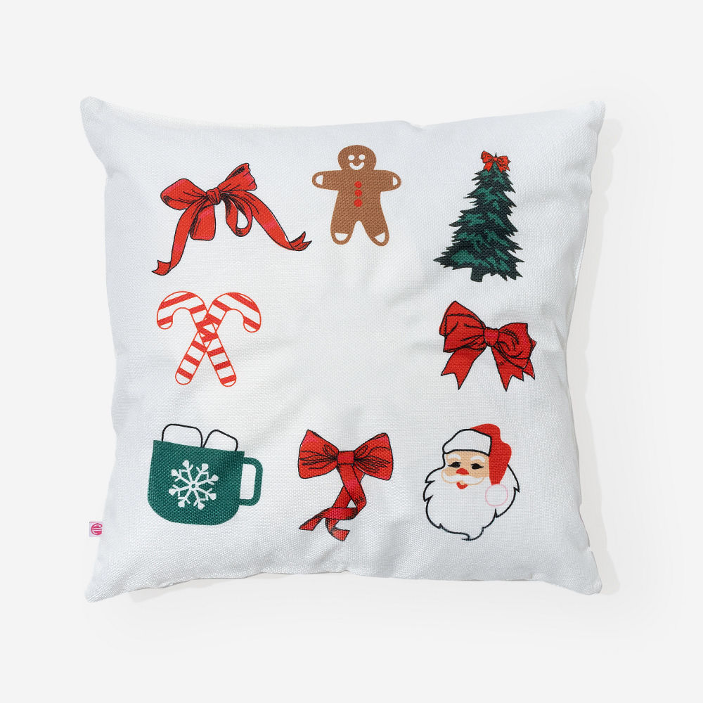 girl holding monogrammed holiday wreath pillow
