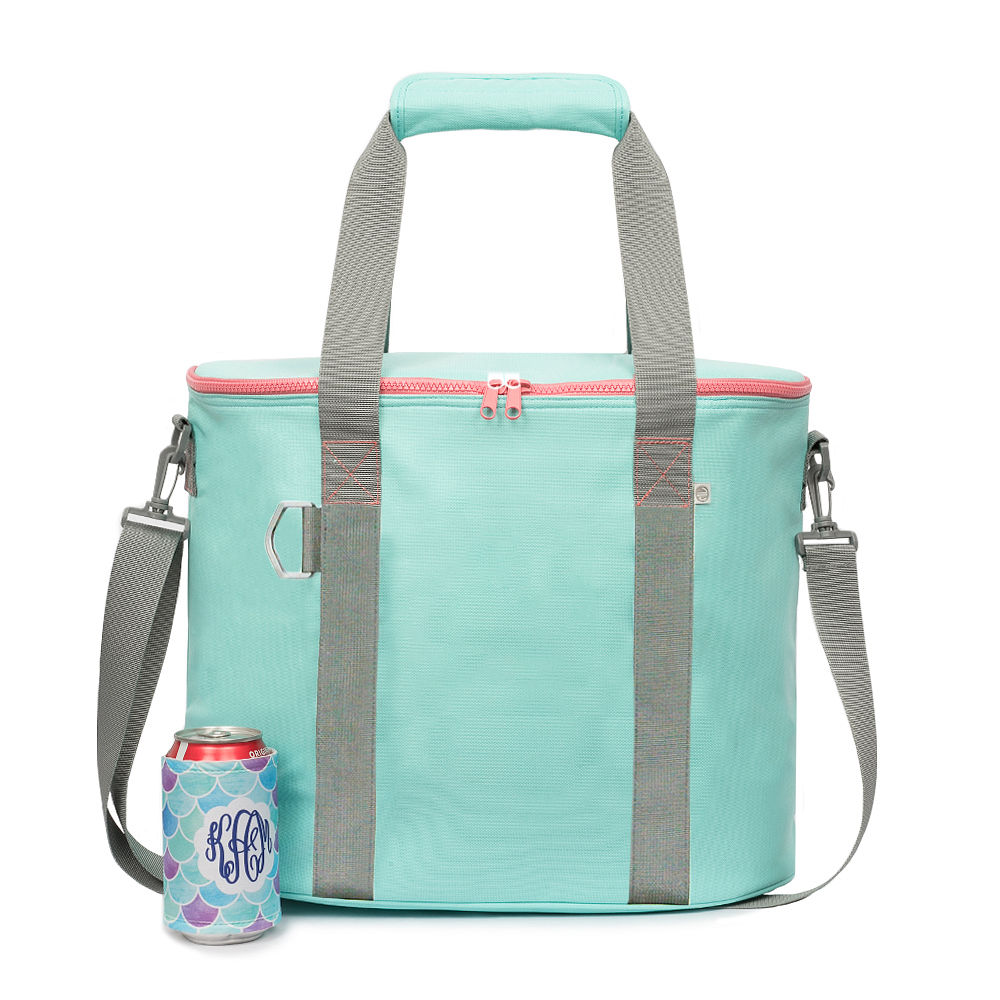 inside of monogrammed mint cooler with water bottles and food