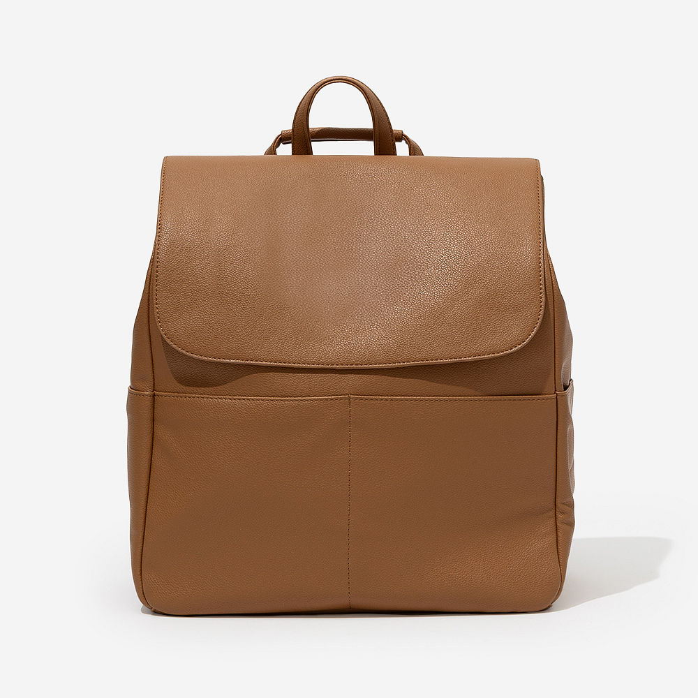 girl with monogrammed diaper backpack purse over shoulder