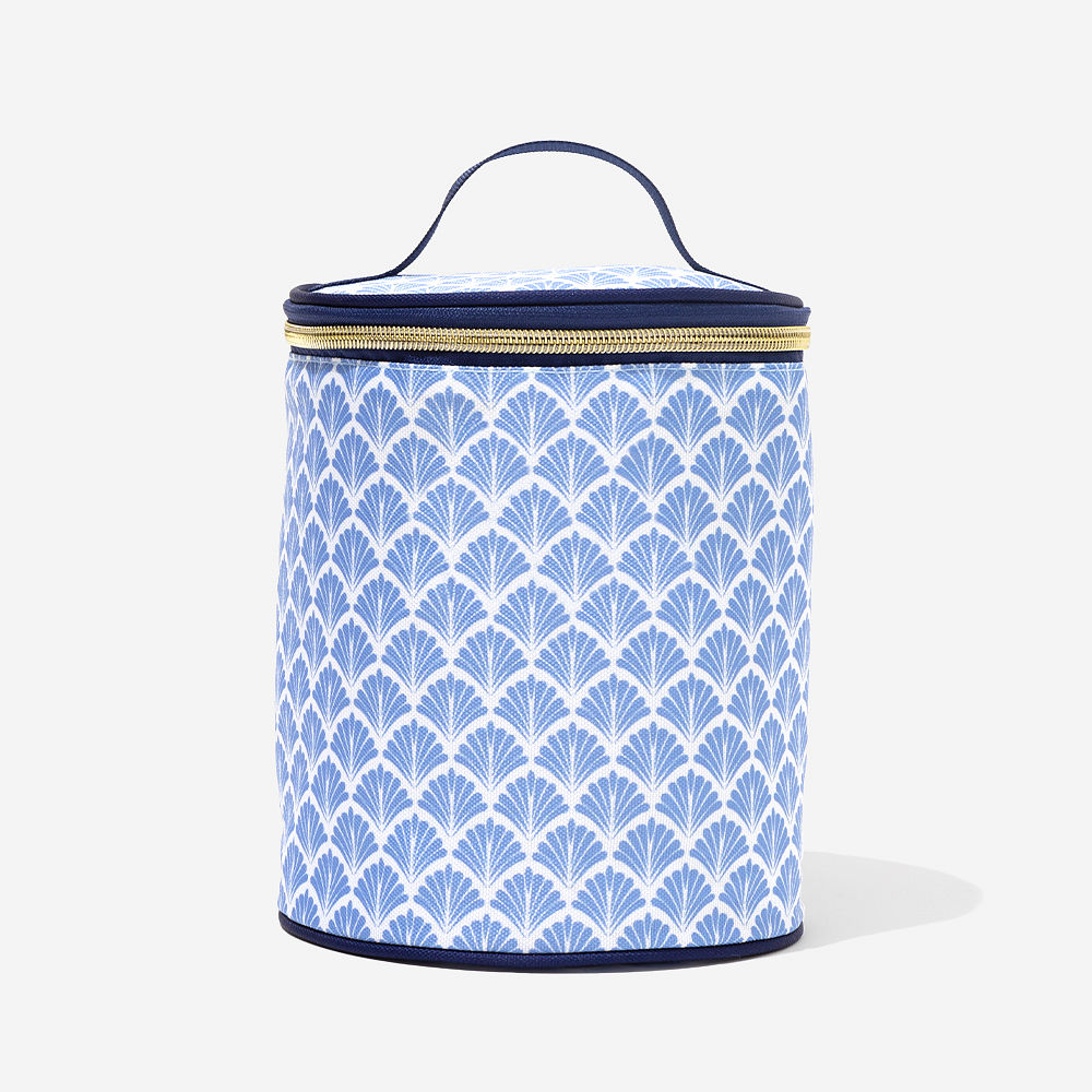 monogrammed blue shells ditty bag on bathroom counter