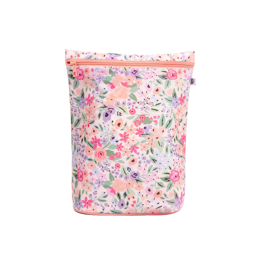 monogrammed blue shells ditty bag on bathroom counter