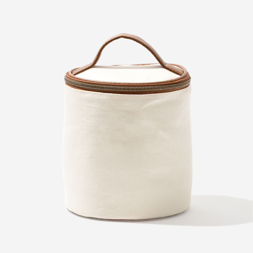 monogrammed blue shells ditty bag on bathroom counter