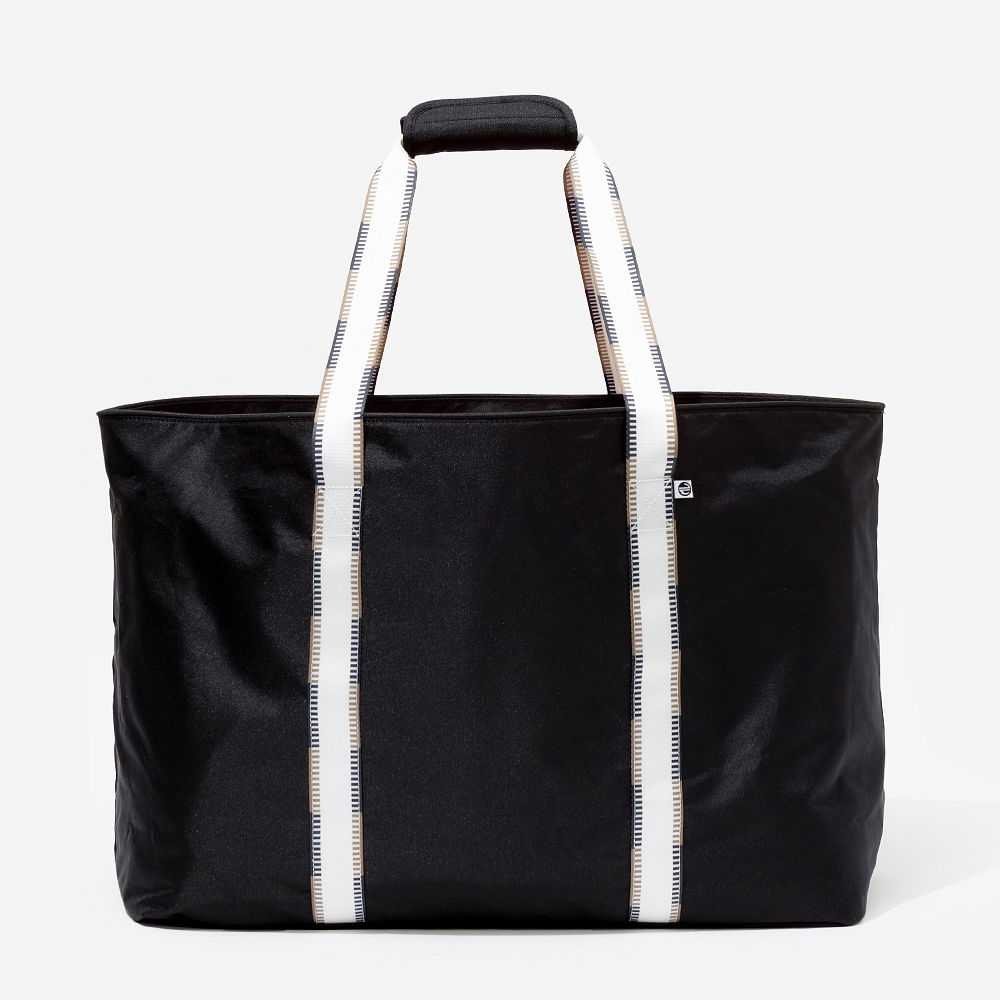 black spottie extra large tote bag in hand