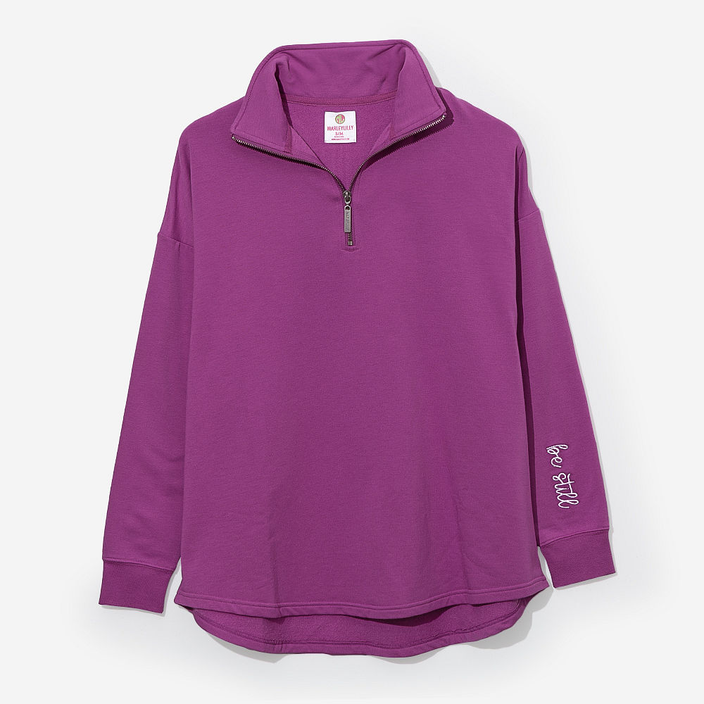 girl wearing monogrammed faith pullover in orchid
