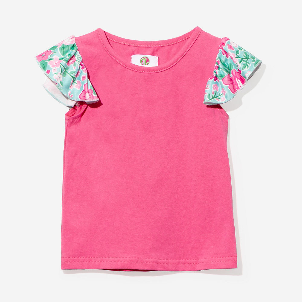 back of monogrammed girls ruffle short set in floral burst