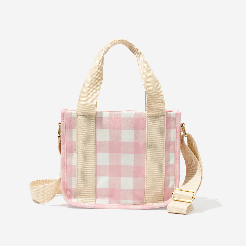 pink gingham girls tote bag in hands