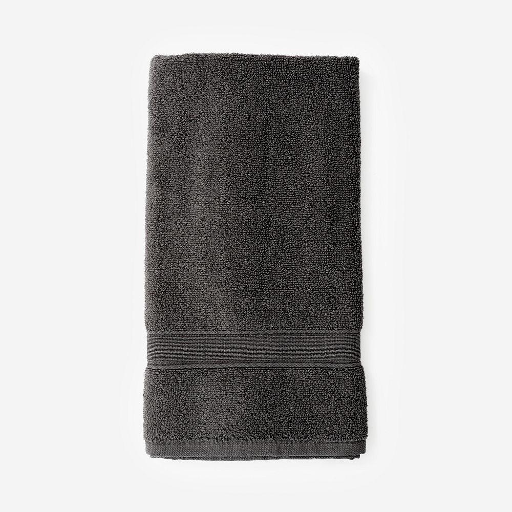 grey hand towel on towel holder