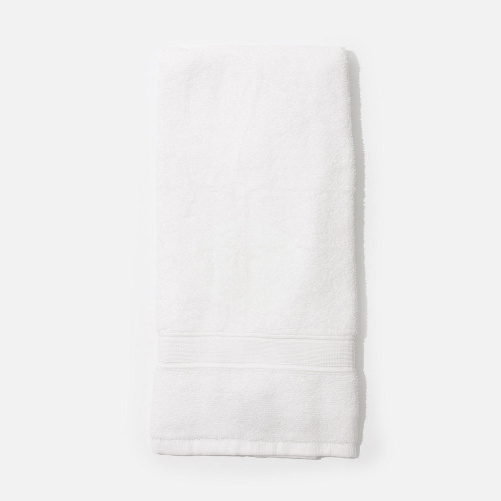 white hand towel with bath towel