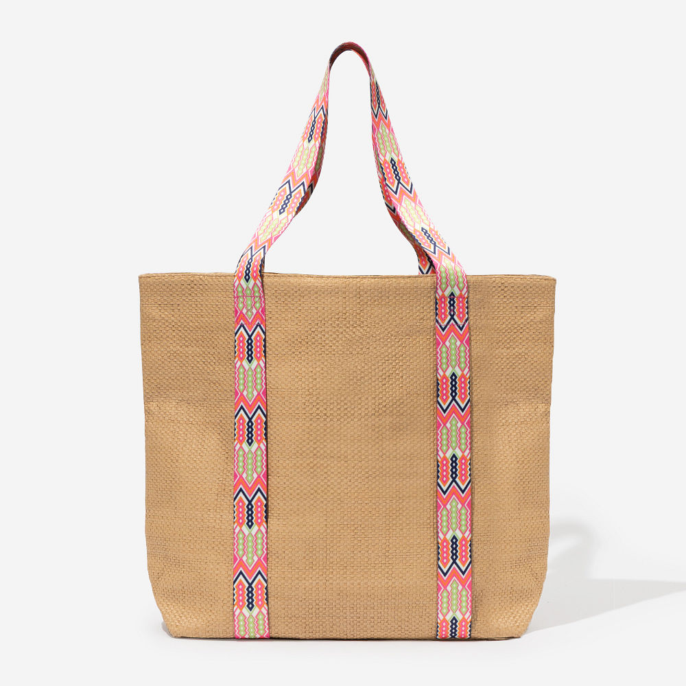 hat carrier monogrammed tote in hot pink over shoulder at pool