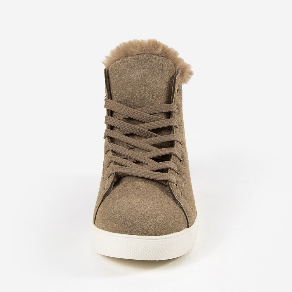 side view of tan sneakers