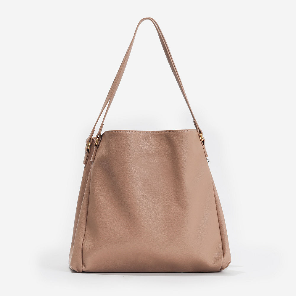 tan hobo purse studio shot