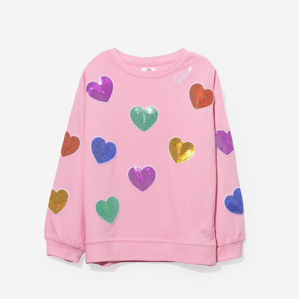 back of girl wearing kids sequin hearts sweatshirt
