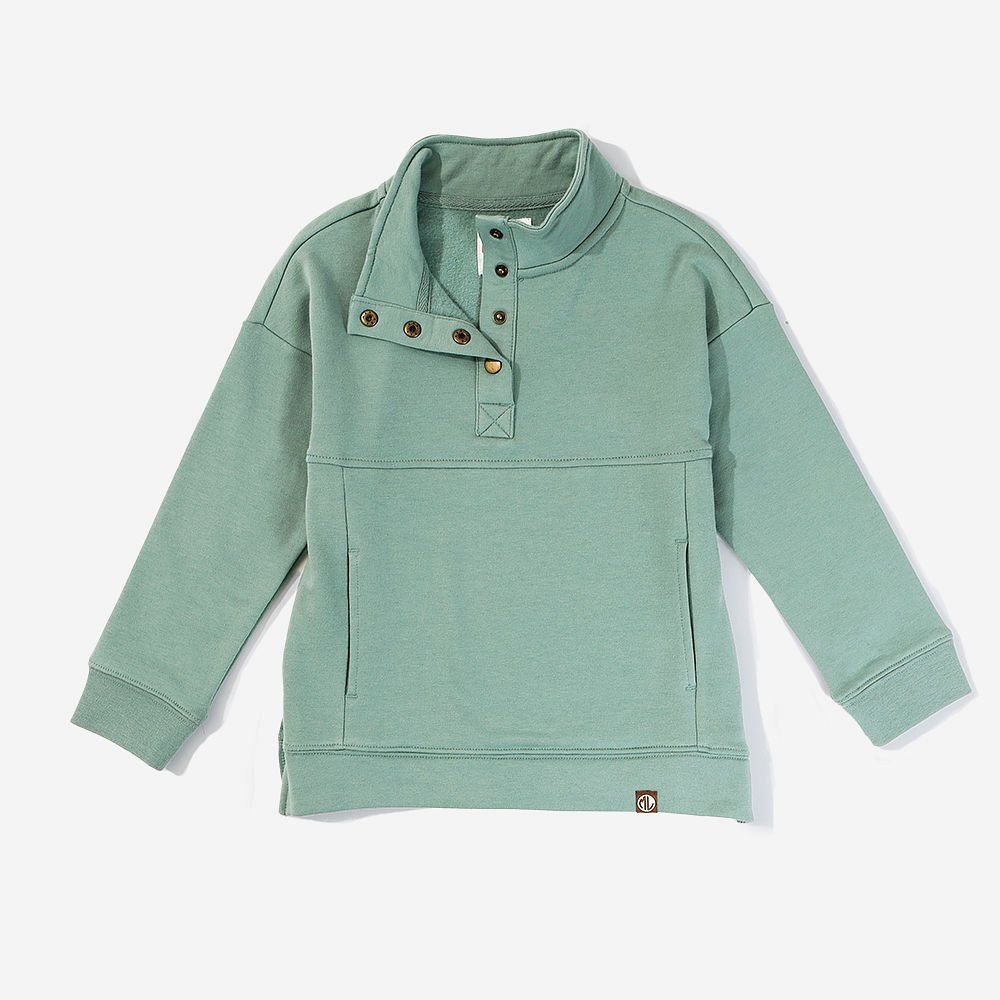 toddler in sage sweatshirt and leggings
