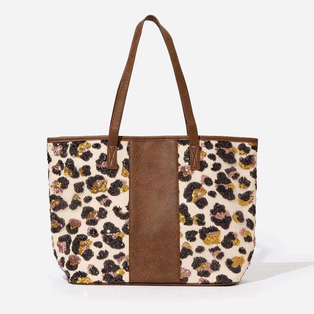 personalized leopard tote bag in leopard spots over shoulder