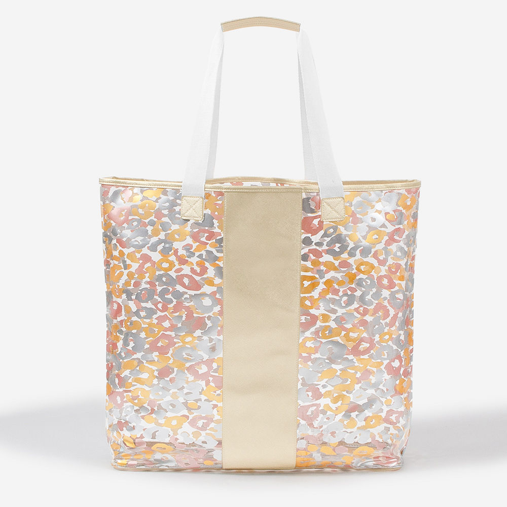 navy blue massive beach bag with monogrammed tumbler and beach accessories