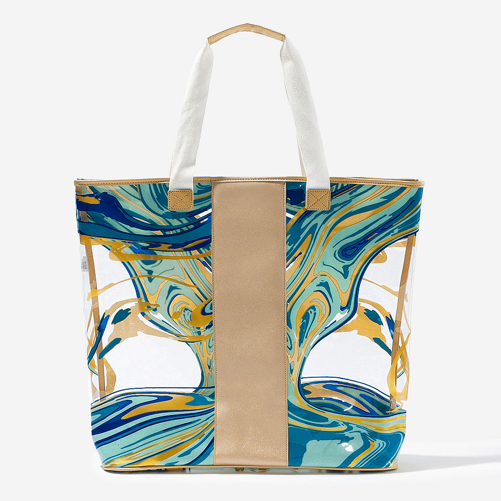 navy blue massive beach bag with monogrammed tumbler and beach accessories