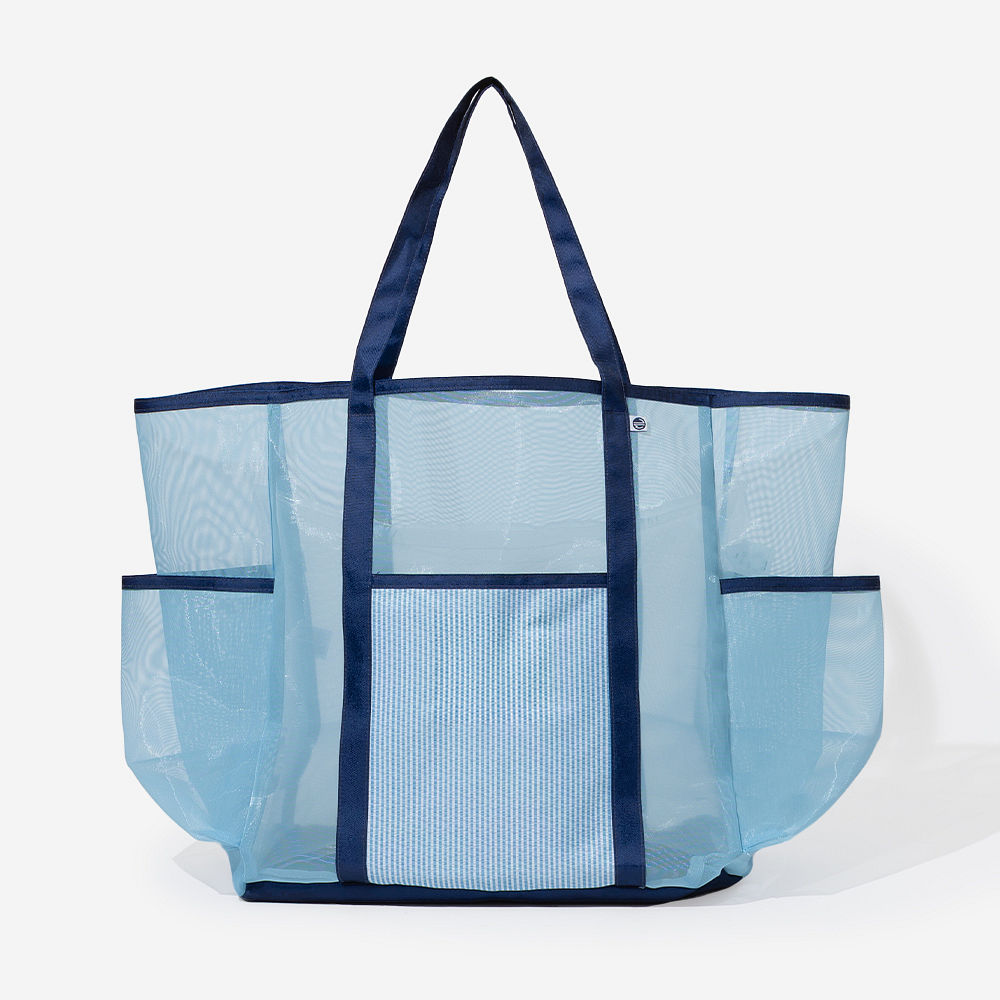 girl swinging flamingo splish splash mesh tote with pool rings