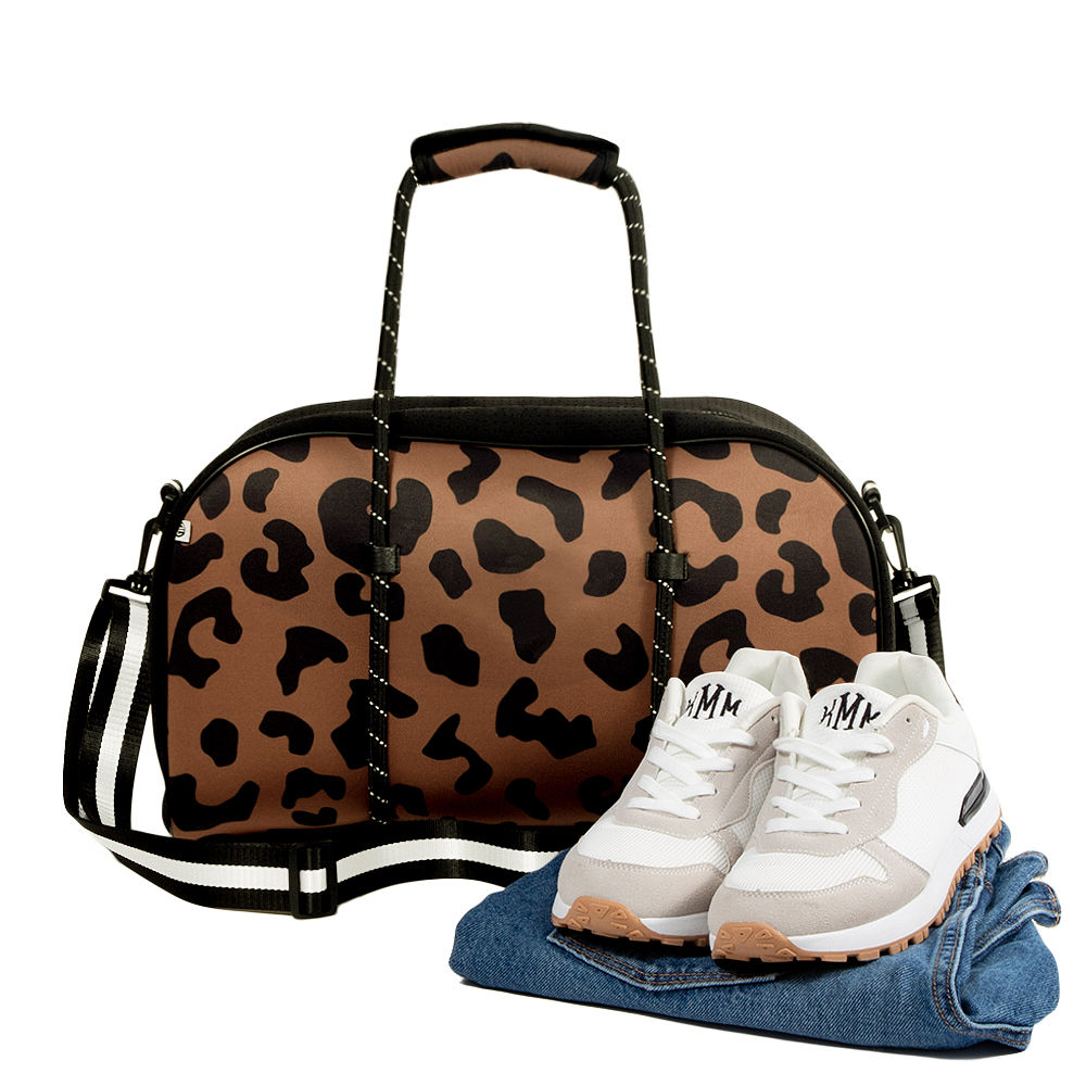 hickory leopard neoprene gym bag in hands