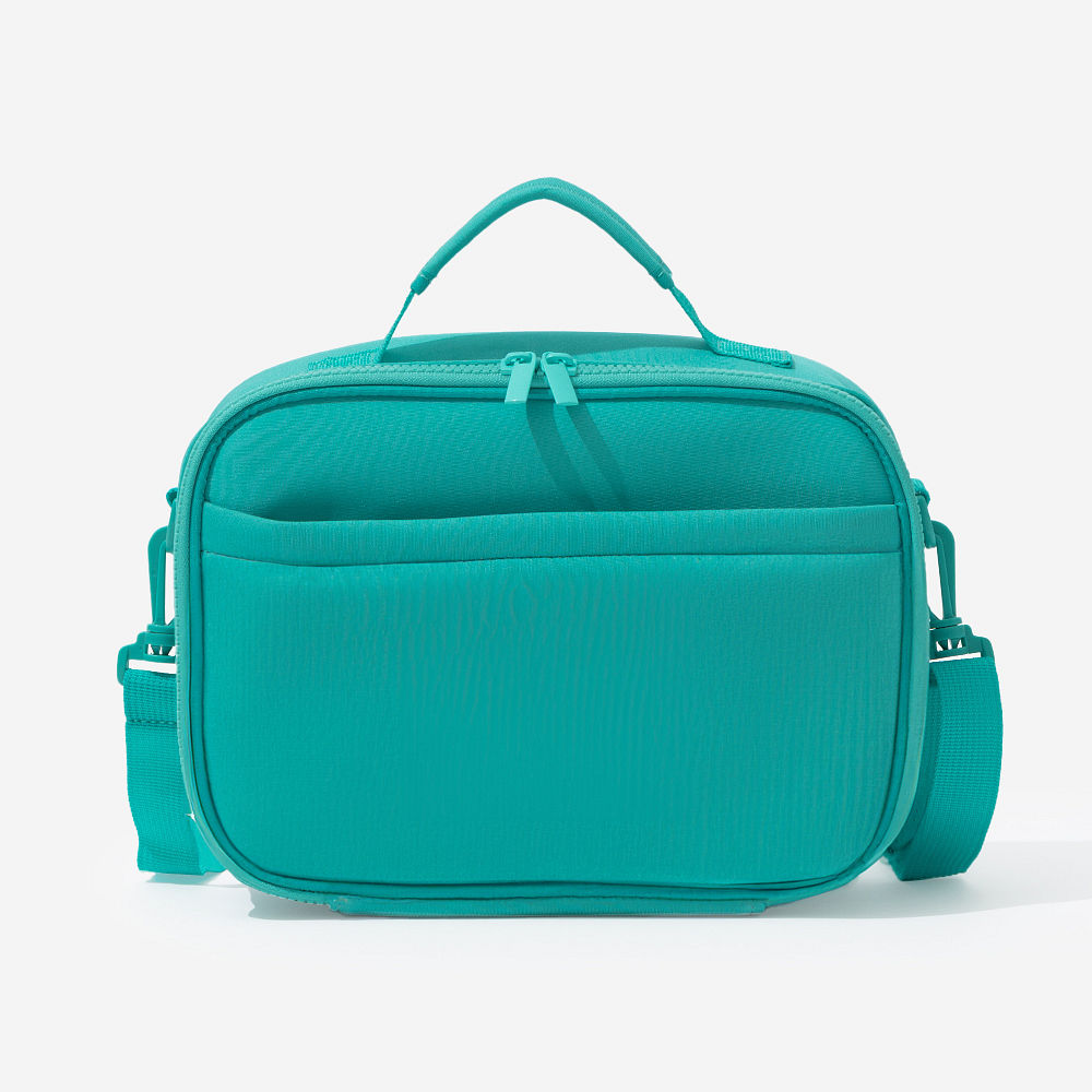 black neoprene lunch bag on desk