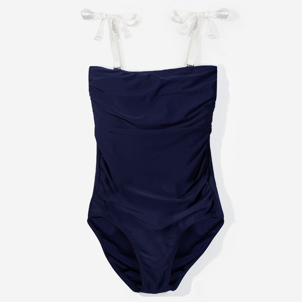 back of black monogrammed one piece bathing suit showing coverage