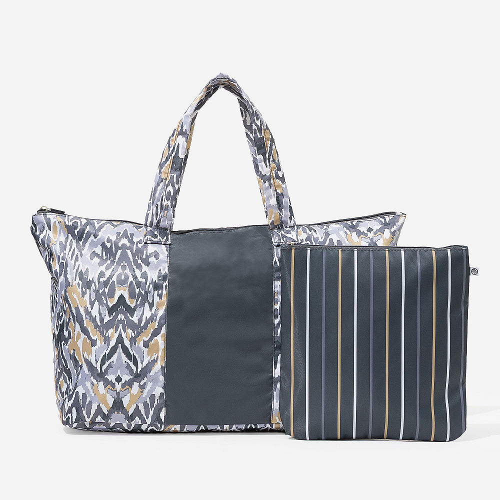 black packable duffel bag in car