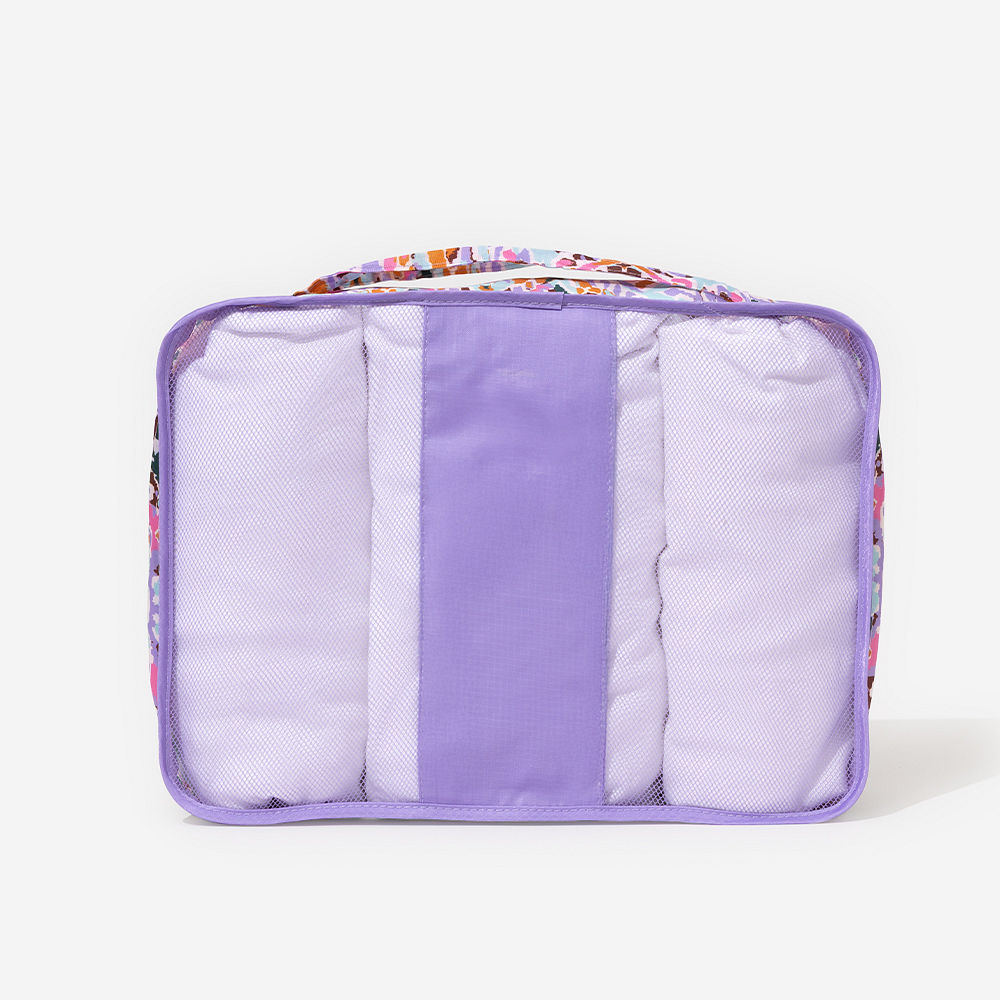 watercolor cheetah packing bag set stacked up close