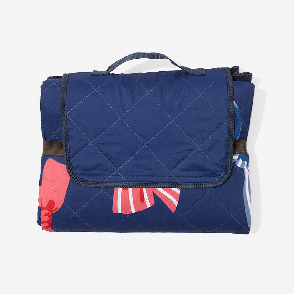 close up of personalized picnic blanket in navy seersucker