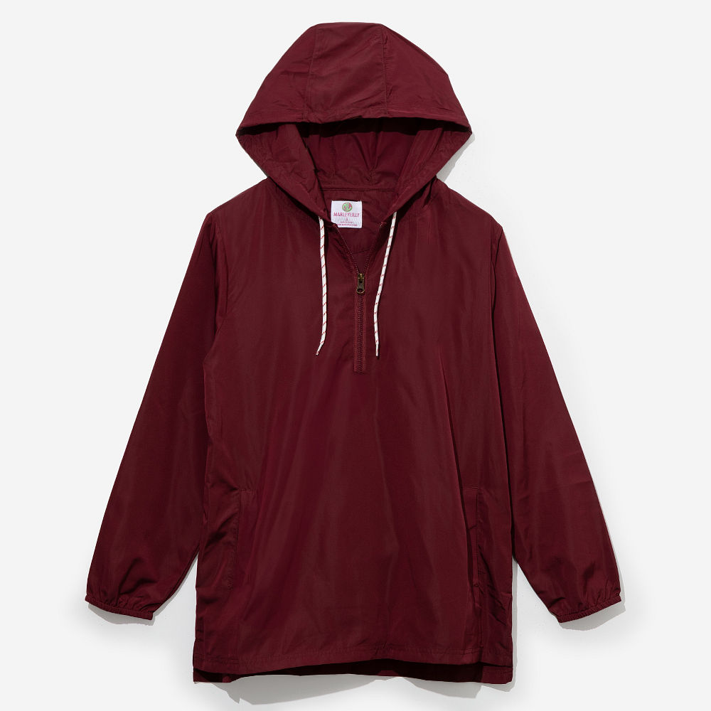 black monogrammed pullover windbreaker with athletic shorts