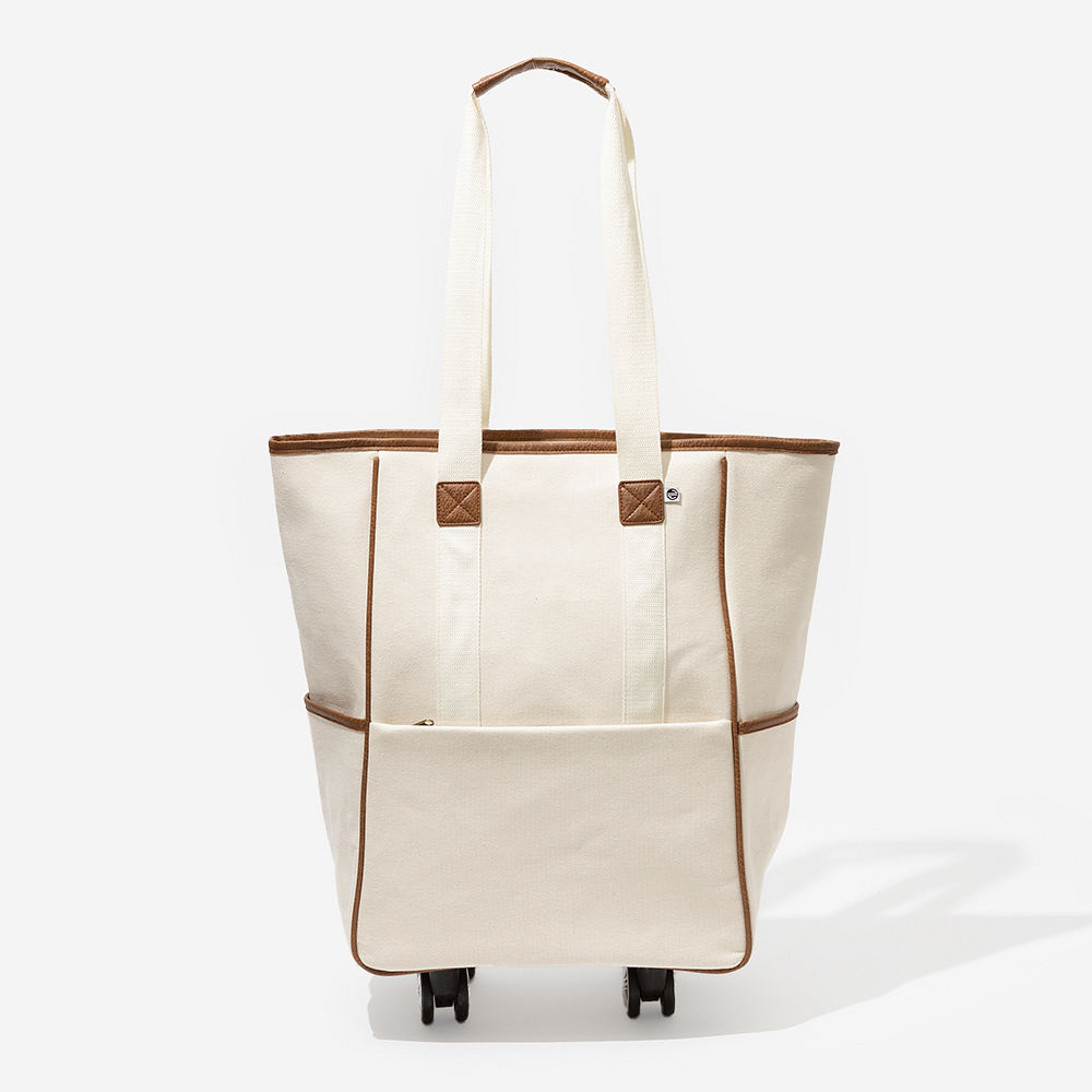 ivory rolling tote in hand