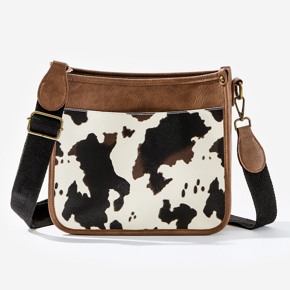 ivory leopard saddlebag on meredith