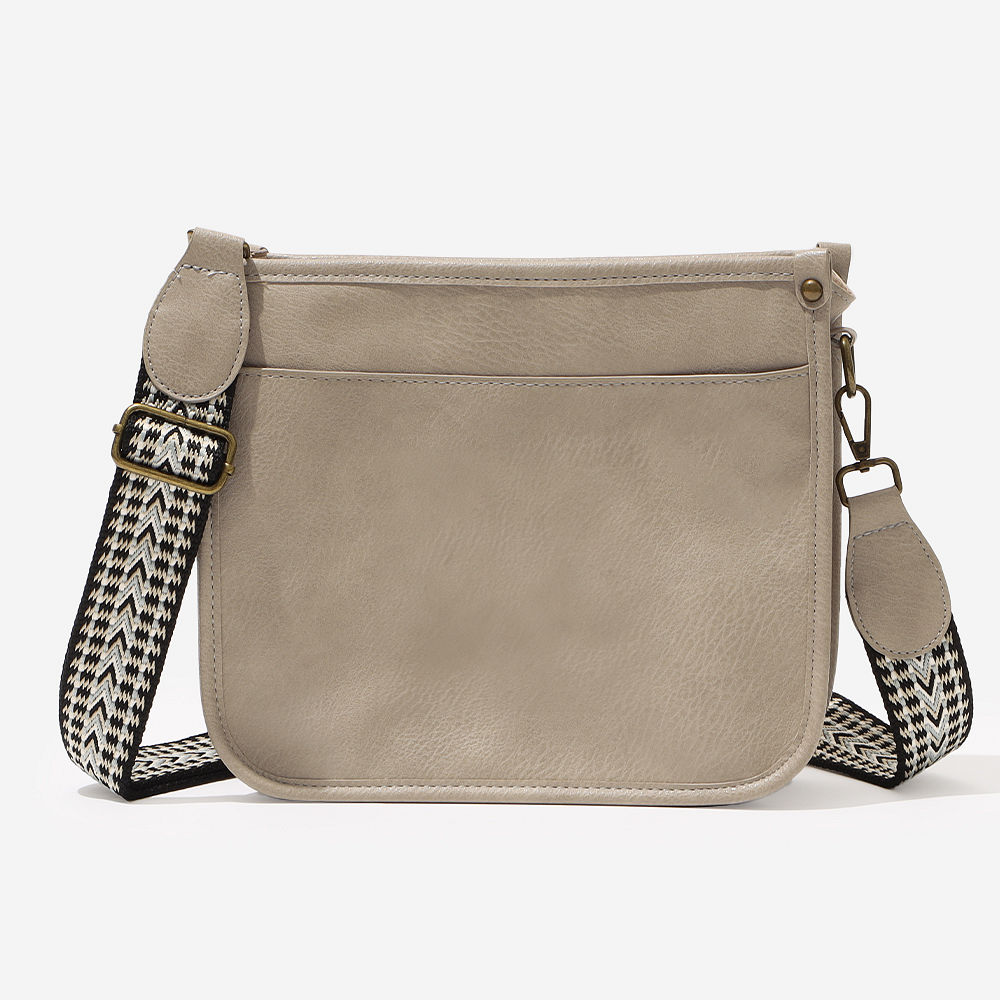 white leopard saddlebag on model