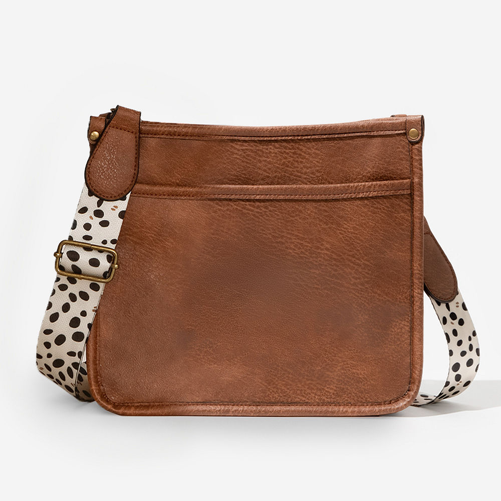 white leopard saddlebag on model