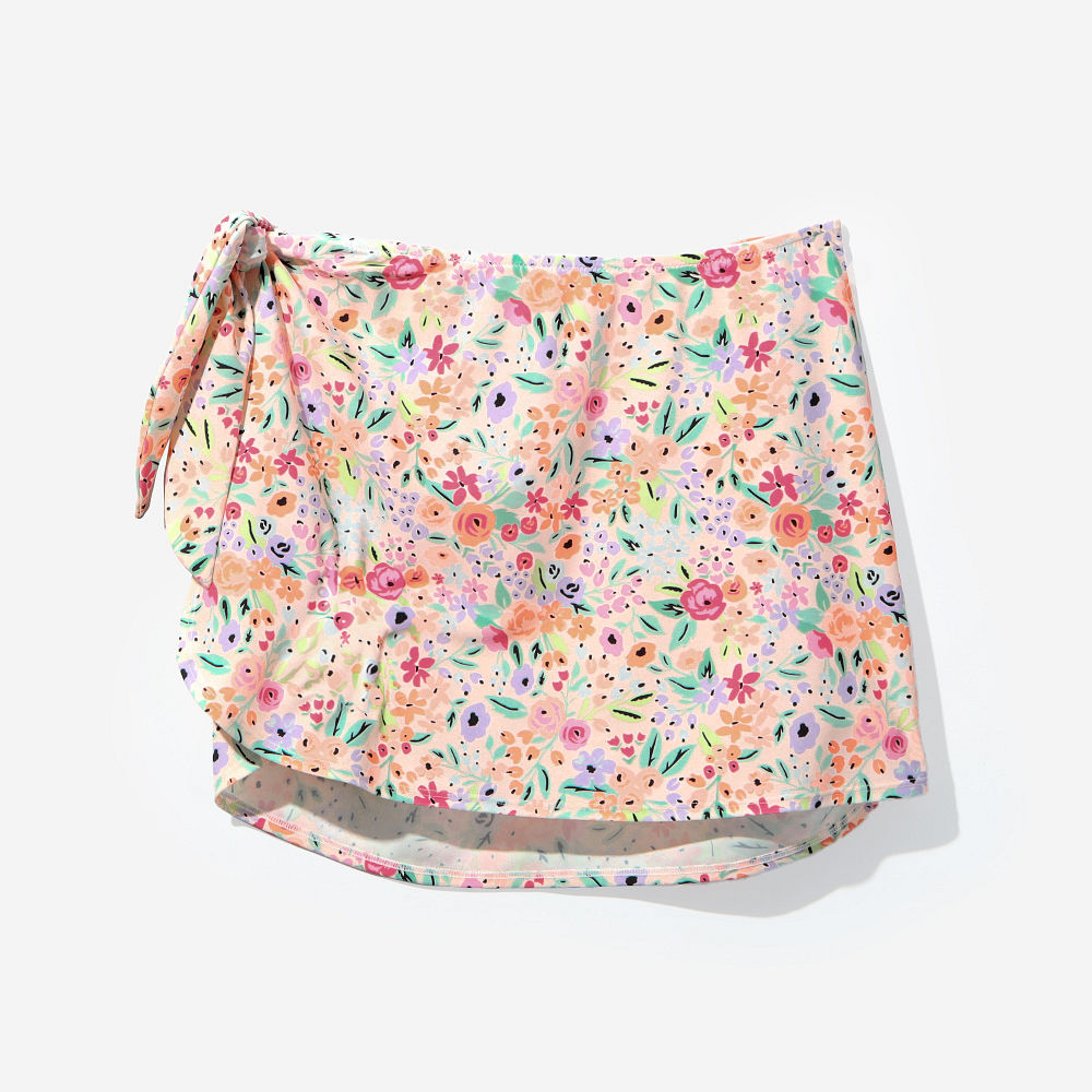 black monogrammed sarong with striped one piece bathing suit