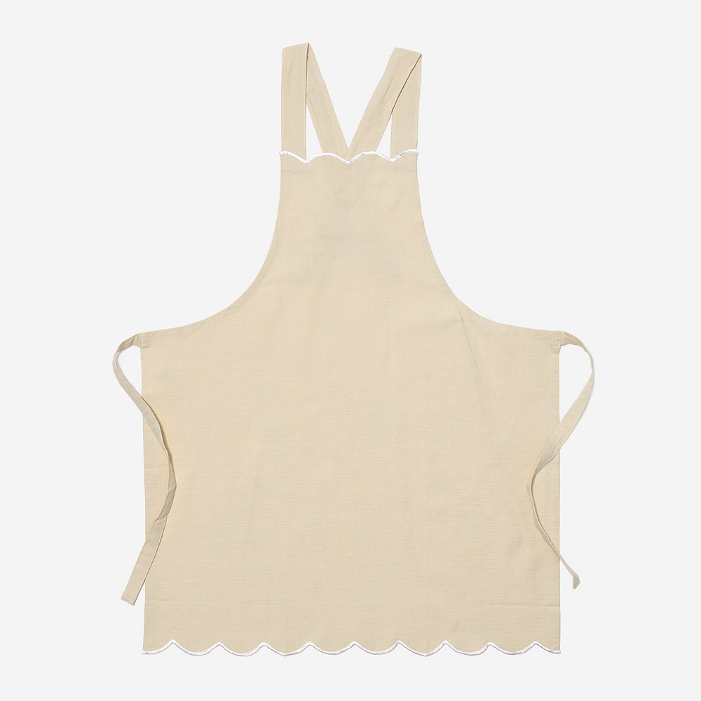 pink scalloped apron on peyton