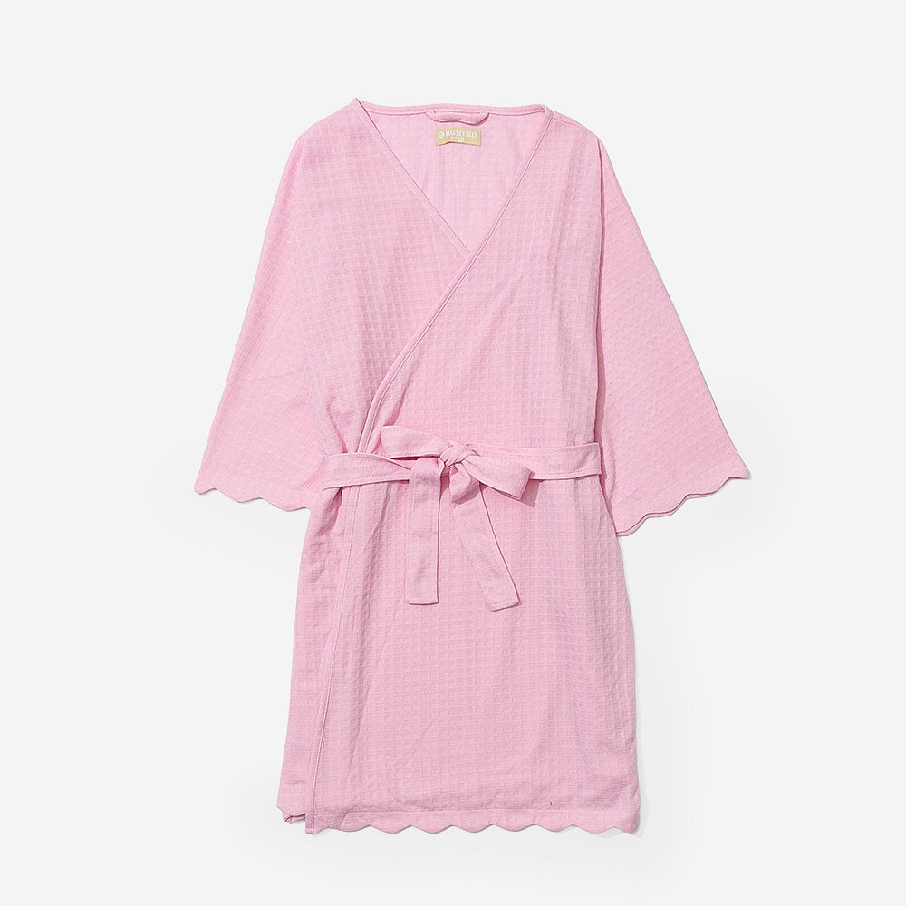 pink and white scalloped robes detail shot