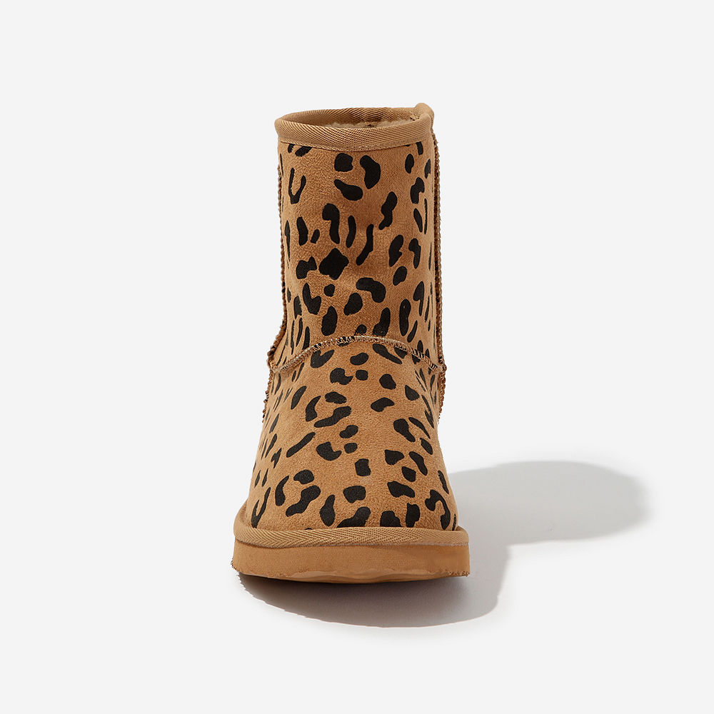 studio shot of leopard print sherpa booties