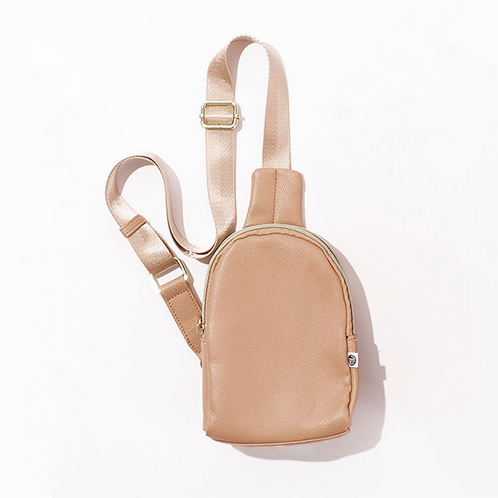 brown sling bag on plus size model