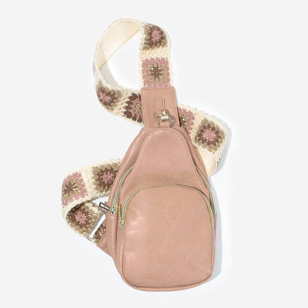 mauve sling purse with tan saddlebag