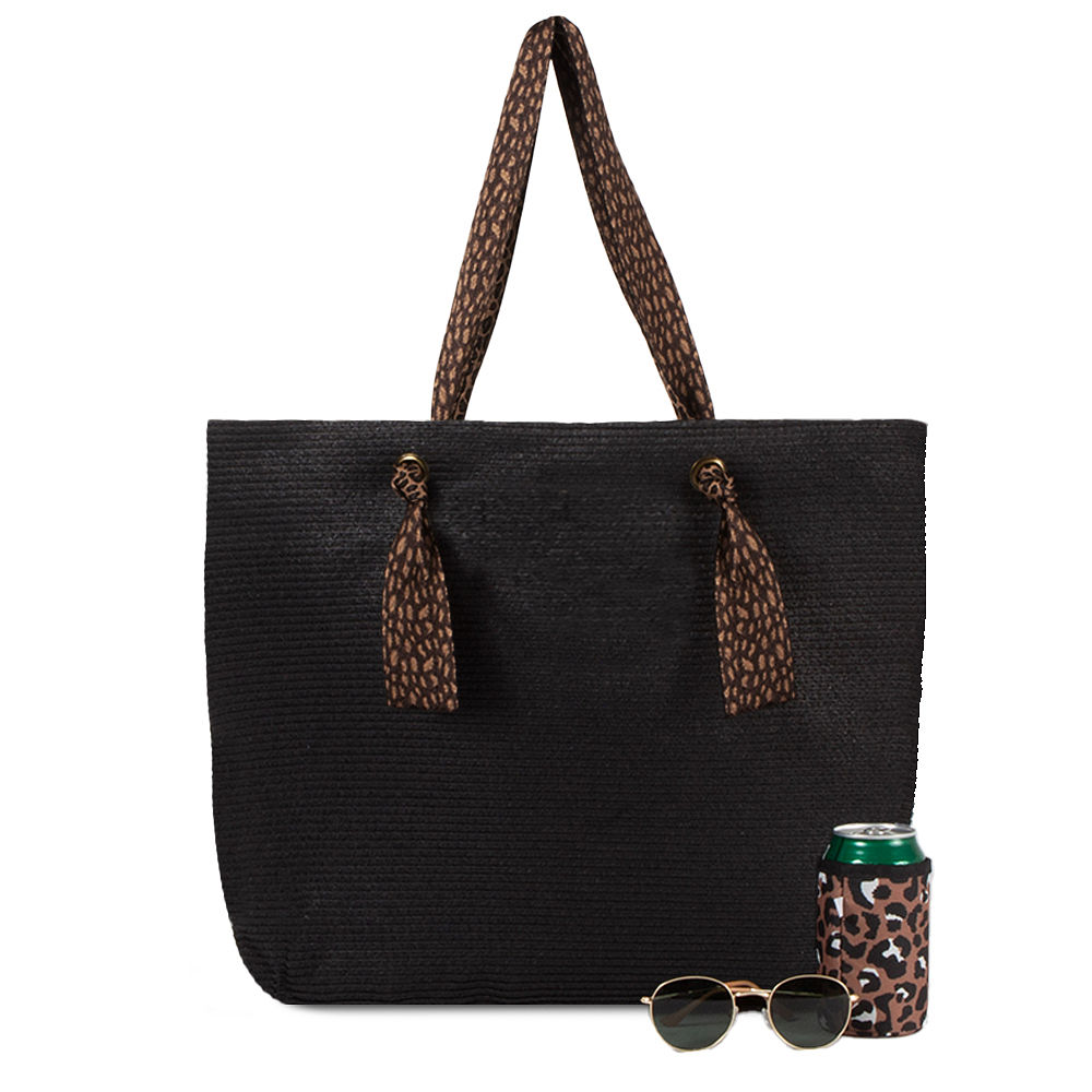 monogrammed straw purse in car